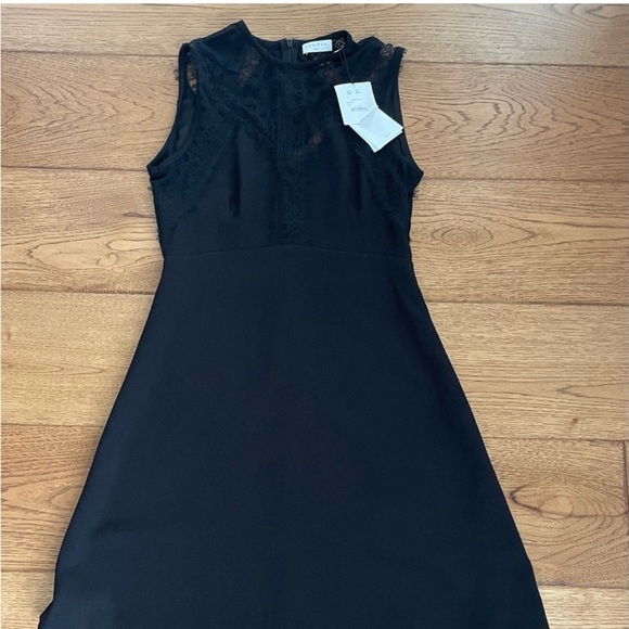 Sandro little black dress with lace inserts. Made in France. Fits like a small. - Picture 3 of 5